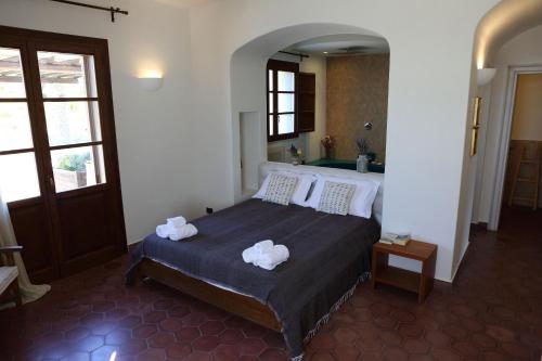 Postel nebo postele na pokoji v ubytování Casa Balata Farm House