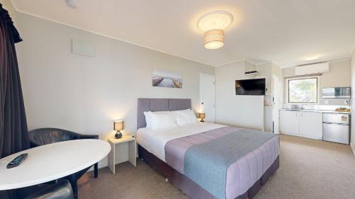 Kuchyň nebo kuchyňský kout v ubytování Albatross Motel