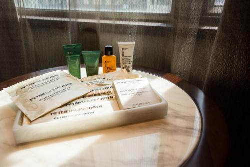 a table with someented products on top at Wharney Hotel in Hong Kong