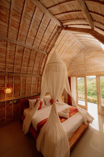 Ένα ή περισσότερα κρεβάτια σε δωμάτιο στο Sunrise Villa Penida