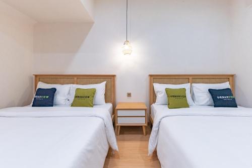 Ένα ή περισσότερα κρεβάτια σε δωμάτιο στο Casabella Bandung PVJ CIWALK PASTEUR LEMBANG