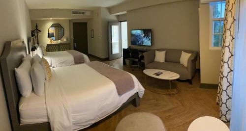 Postel nebo postele na pokoji v ubytování Hollywood Hotel