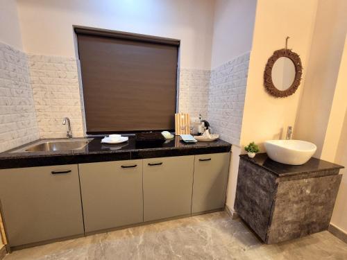 Kuchyň nebo kuchyňský kout v ubytování Antares Group Luxe Apartment