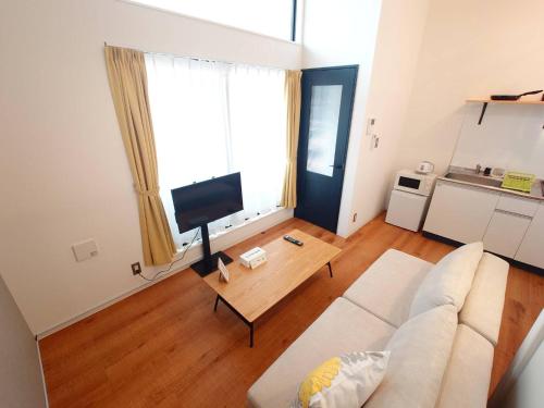 Kuchyň nebo kuchyňský kout v ubytování Neighbor's Hotel 五日市コイン通り