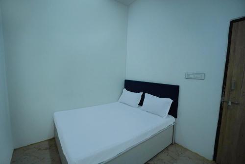 Postel nebo postele na pokoji v ubytování Hotel O Park Side
