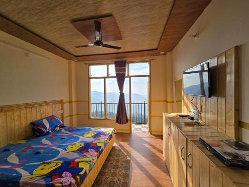 Postel nebo postele na pokoji v ubytování HiLL Mount View Dalhousie Talai Chamba