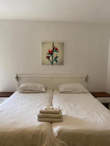 Ένα ή περισσότερα κρεβάτια σε δωμάτιο στο St. Lucia Safari Lodge