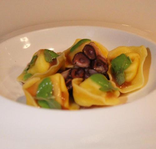 a white bowl of food on a white plate at Bes Hotel Terme a Palazzago in Palazzago