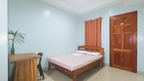 Postel nebo postele na pokoji v ubytování Bello Vue Apartelle