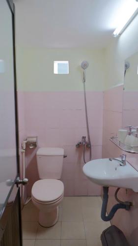 a bathroom with a toilet and a sink at Hue Ancient Town - Homestay in Hue in Hue