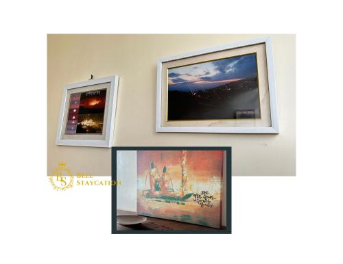 three pictures hanging on a wall in a room at Baguio BELL Staycation in Baguio
