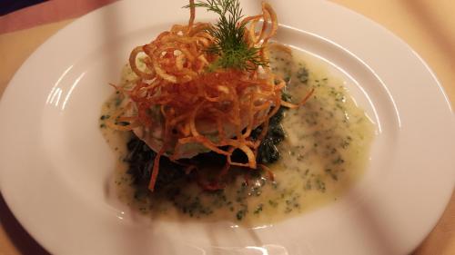 a plate of food with pasta on a table at Gasthof Pfauen in Oberkirch