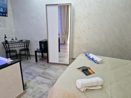 Ένα ή περισσότερα κρεβάτια σε δωμάτιο στο Sicily Luxury Apartment by Holiday World