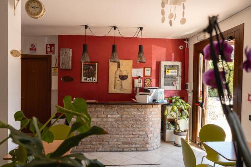 Kuchyň nebo kuchyňský kout v ubytování Hotel Le Corti