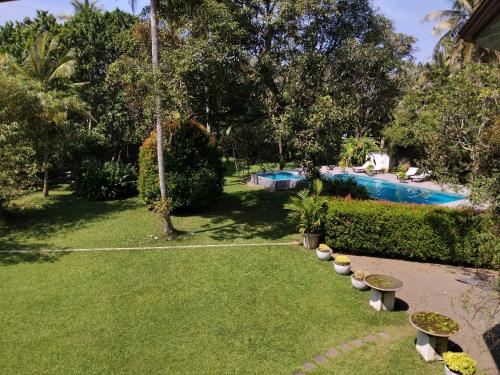 Πισίνα στο ή κοντά στο Villa Dewasiri