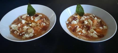 two white bowls of food with food in them at Les Vagabonds du Mont in Chichilianne
