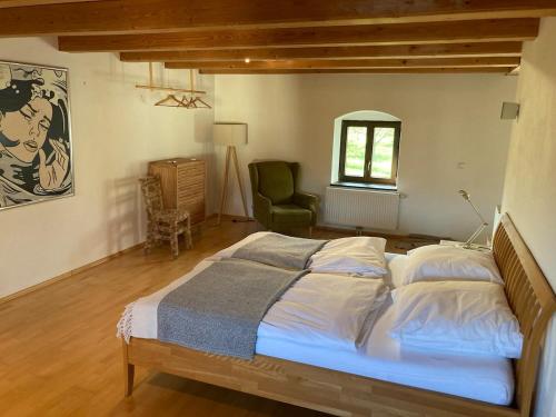Postel nebo postele na pokoji v ubytování Apartment im Loefengut