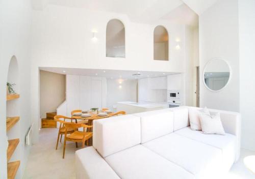 Katil atau katil-katil dalam bilik di Santorini by The Heim Residences