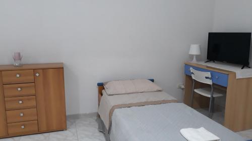 Postel nebo postele na pokoji v ubytování DOMUS PRINCIPESSA - Chieti