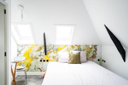 Postel nebo postele na pokoji v ubytování Boetiekhotel Villa Wanrooy
