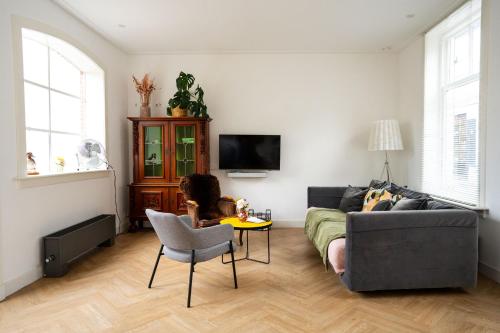 Μια τηλεόραση ή/και κέντρο ψυχαγωγίας στο Boetiekhotel Villa Wanrooy