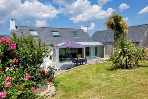 a house with a garden and a patio at Tipoz'Immo Ti Marin beach accessrestaurants on foot in Plovan