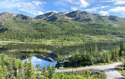 a view of a lake with mountains in the background at Lovely Apartment In Rjukan With Wifi in Rjukan