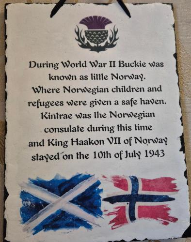 a plaque with a painting of the uk flag at Kintrae B&B in Buckie