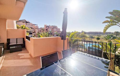 a balcony of a building with a view of the water at Beautiful Apartment In Torrepacheco in Torre-Pacheco