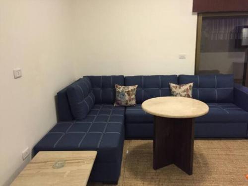 Χώρος καθιστικού στο Royal Luxury Amman Central Apartments