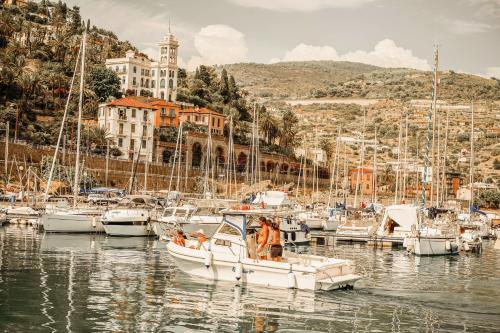a bunch of boats docked in a harbor at Residenza Villa Genua in Bordighera