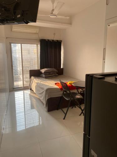 Ένα ή περισσότερα κρεβάτια σε δωμάτιο στο Maati Properties, Room 313
