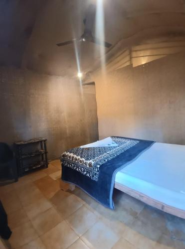 Postel nebo postele na pokoji v ubytování Love paradice huts
