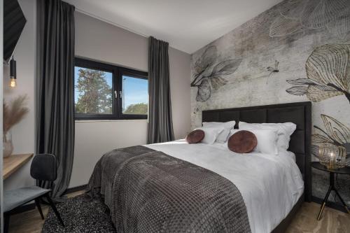 Katil atau katil-katil dalam bilik di Villa Quercus ZadarVillas