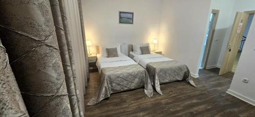 Postel nebo postele na pokoji v ubytování Hotel N