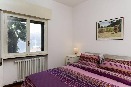 Postel nebo postele na pokoji v ubytování Ranco Villa - 14006