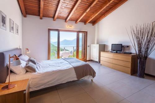Ένα ή περισσότερα κρεβάτια σε δωμάτιο στο Villa Sereni - 115