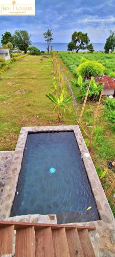 Bazén v ubytování A Mango Tree House with a private swimming pool nebo v jeho okolí