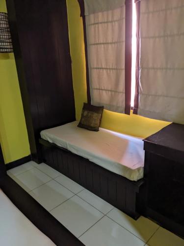 Ένα ή περισσότερα κρεβάτια σε δωμάτιο στο Azure Stays Patong