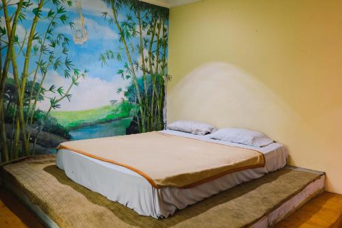 Postel nebo postele na pokoji v ubytování King Stone Hotel