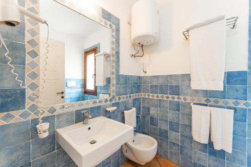 Ένα μπάνιο στο Gallura style Res Baia Del Mirti M3 Studio sleeps3