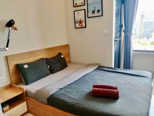 Katil atau katil-katil dalam bilik di Stay With Me Saigon Apartment - Rivergate Building
