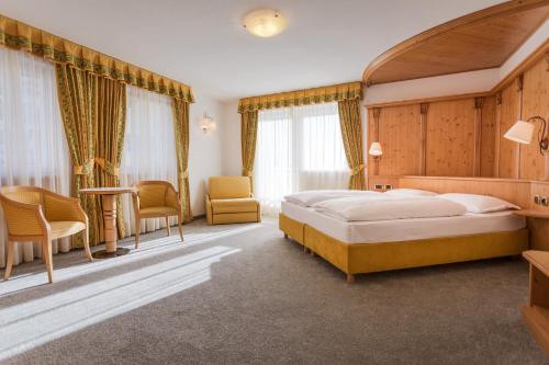 Postel nebo postele na pokoji v ubytování Hotel Maria
