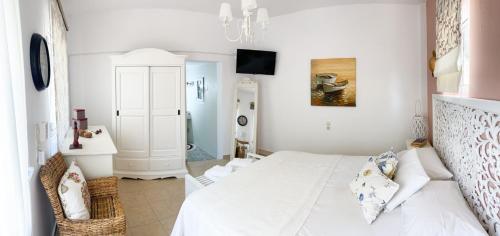 Postel nebo postele na pokoji v ubytování Myrtia - Cretan Guest House