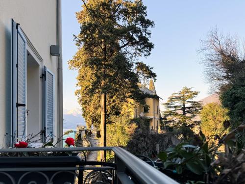 a view of a building from a balcony at Villa Rêverie - Boutique Hotel in Bellano