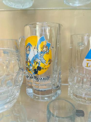 a set of glasses sitting on a shelf at Monticello Bungalow in Kotmale