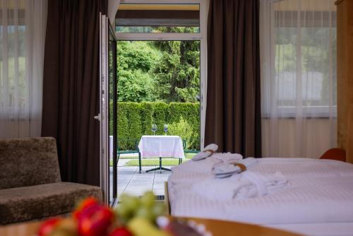 Posteľ alebo postele v izbe v ubytovaní Alpine Spa Residence