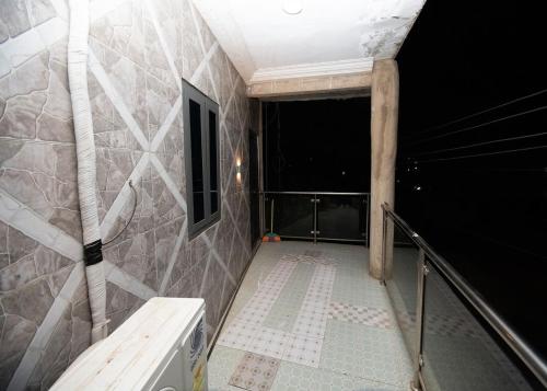 Ένα μπάνιο στο Lapaz Comfort Suites