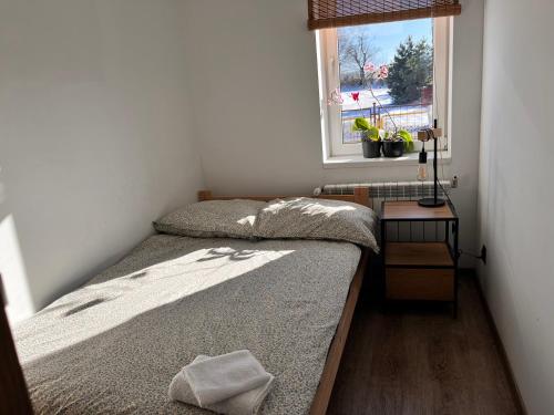 Postel nebo postele na pokoji v ubytování Apartament numer 1, dwie sypialnie dwa łóżka
