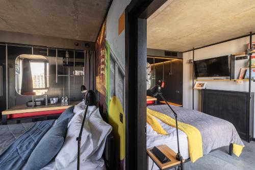 Łóżko lub łóżka w pokoju w obiekcie !FEST Hotel